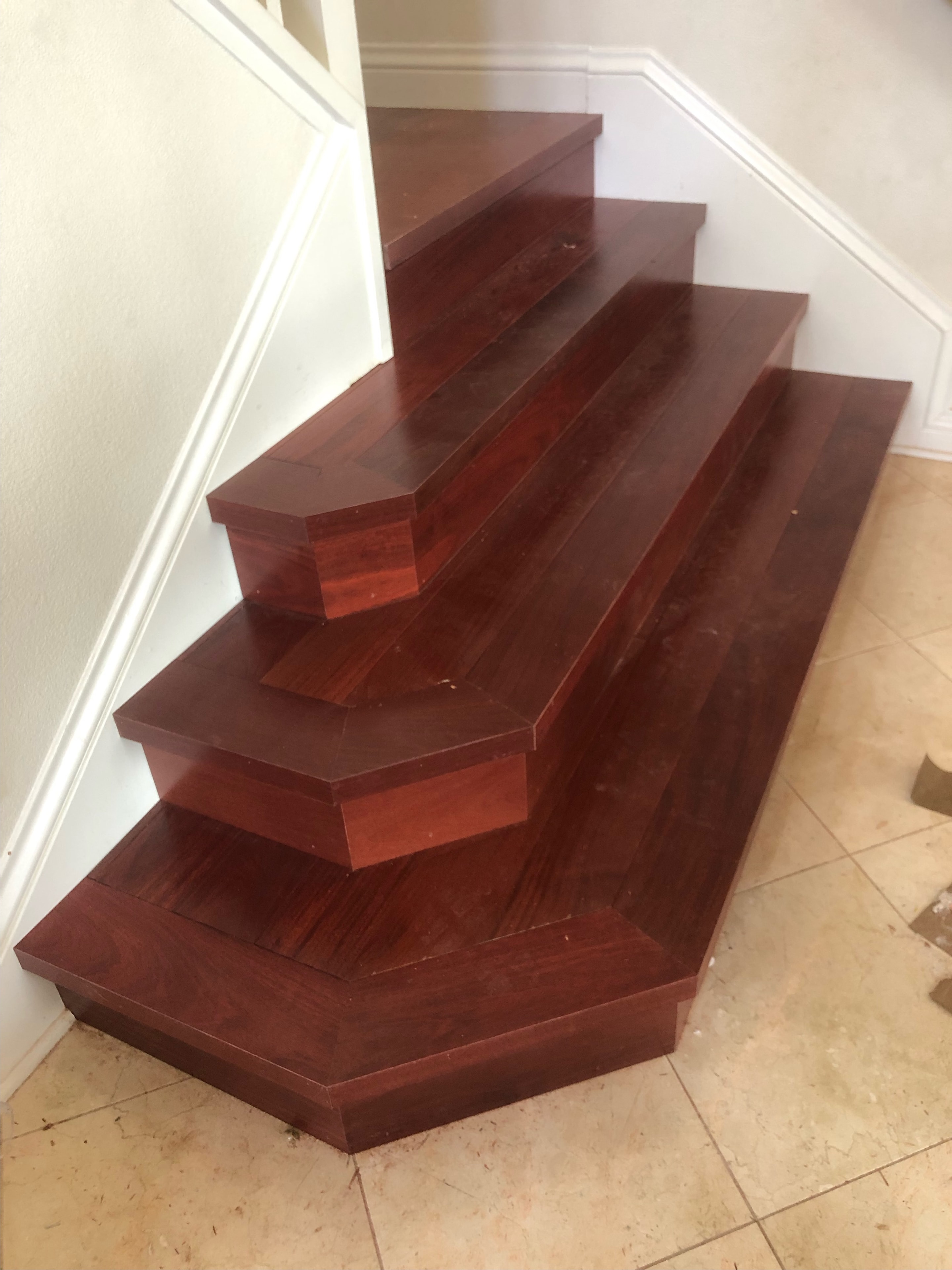Rich dark red burgundy hardwood staircase treads